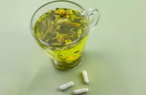 cápsulas de chá verde Ilustração de cápsulas de chá verde